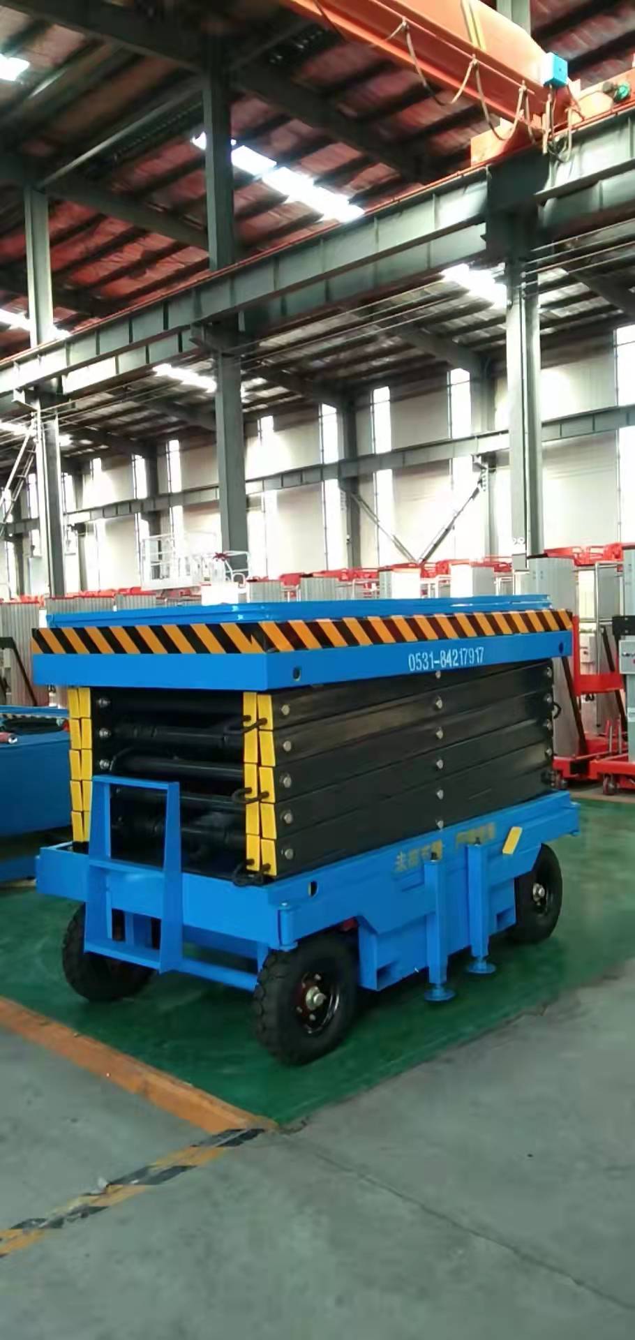 肥城康王酒業定制10米移動剪叉升降機(圖1) 1f864b47f5fbcf62499c1ce0f5762f9.jpg